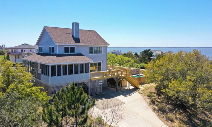 Carolina Dunes Casa | Pet-friendly oceanside Duck home w/ pool, hot tub, sound and sunset views!