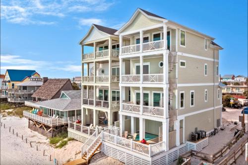 Lower Grand Lagoon Casa | Pineapple Paradise! 6BR 7BA beachfront house! Private Pool! Grill! Sleeps 16!