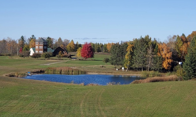 Menominee Cabina | Pinewoods Springs Lodge with Tower, 240 forested acres & 1 acre Pond