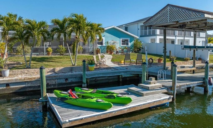 Bal Harbour Casa | Pirates Den a 4BR Pet-Friendly Waterfront Oasis with Pool, Dock, Personal Water Boats, Fire Pit, Game Room and Bar