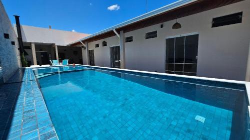 Tupy Casa | Piscina Aquecida, 4 Suítes, Bilhar, Área Gourmet