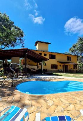 Sao Sebastiao das Aguas Claras Casa | PISCINA AQUECIDA, 5 SUÍTES, trilha privativa até o riacho, Wi-fi, estacionamento, ampla área externa cercada de natureza exuberante - 200m do vilarejo