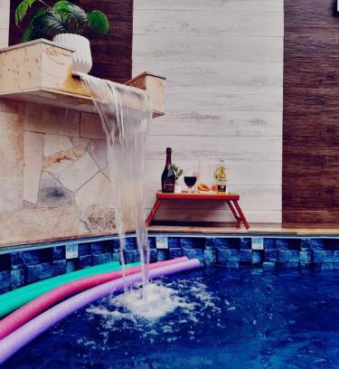 Jardim Praia Grande Casa | Piscina e Churrasqueira - 8 minuto a pé da Praia