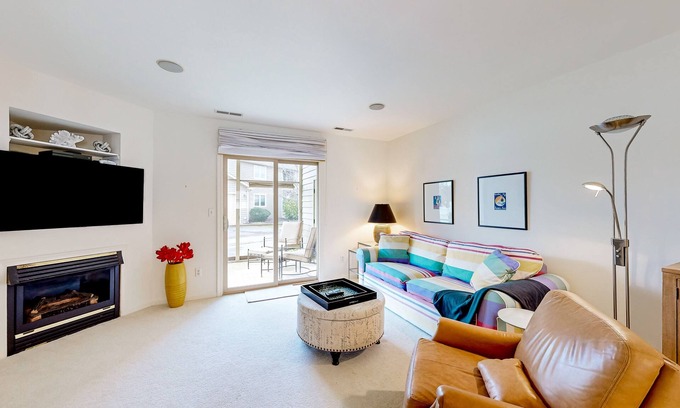 Lewes Casa | Plantations East dog-friendly townhouse with fireplace & water view