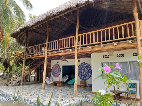 Monitos Casa | Playa Jaguar - Beach Club