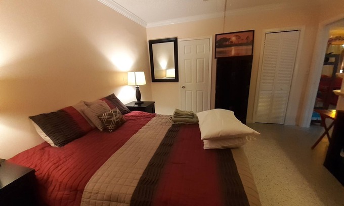 Lake Worth Corridor Casa | Plumaria Room with private bathroom on shared lakeview House