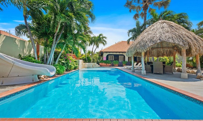 Turibana Villa | 6BR Tropical Paradise, ENORME piscina, jacuzzi, zona de playa con bar.