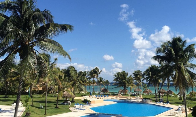 Puerto Aventuras Condominio | ¡Playa privada de arena blanca con una ubicación privilegiada junto a Dolphin Lagoon!