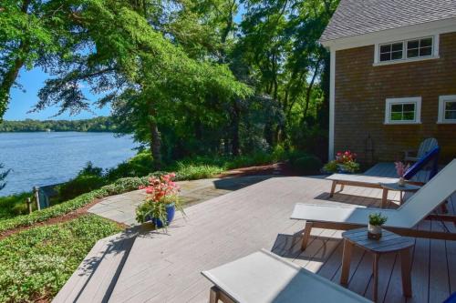 Orleans Casa | Pristine waterfront oasis plus game room jacuzzi and home office