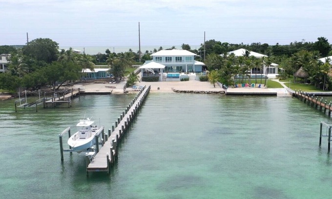 Key Largo Casa | Private Beach Bayside 6 Bedroom Resort Home with Pool, Dock, & Garage
