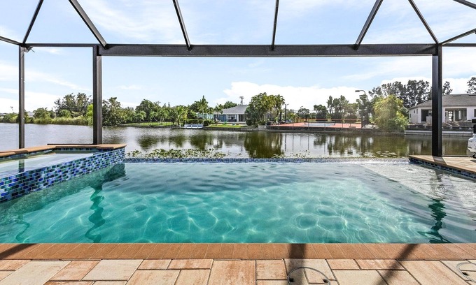 Burnt Store Casa | Private Beach with volleyball, Saltwater pool & spa - Villa Siren Calling - Roelens Vacations