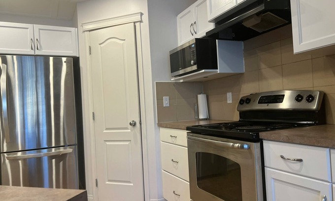 Airdrie Casa | Private bedroom and bathroom