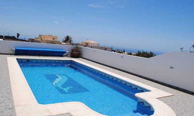 La Asomada Casa | Casita privada en Asomada, piscina climatizada, vistas a Puerto del Carmen y el mar