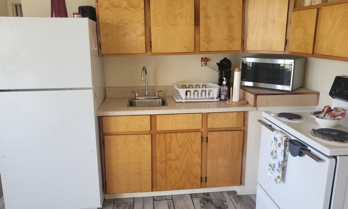 Bay VIew Addition Cabaña | Private & cute as a button! 1400 p/m! Pets OK BBQ & seating on your deck! 400p/w