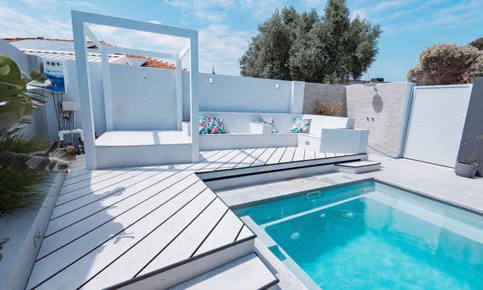 Mindarie Casa | Retiro privado de Mindarie con vistas al jardín, a poca distancia del puerto deportivo y tiendas