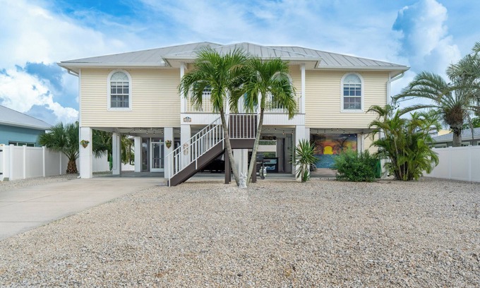 Mid Island Casa | ☀️Private Pool | Canal Front Home with Boat Dock | Beach Bound☀️