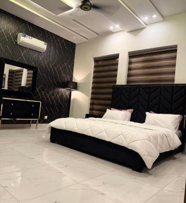 Lahore Casa | Private Suite Air Conditioner with Living Area Kitchen and Garage