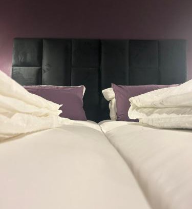 Rastpfuhl Apartamento | Purple Escape Balkon Netflix zentral