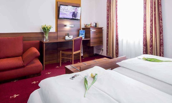 Mitte Hotel | Habitación cuádruple - Hotel Burgschmiet GmbH