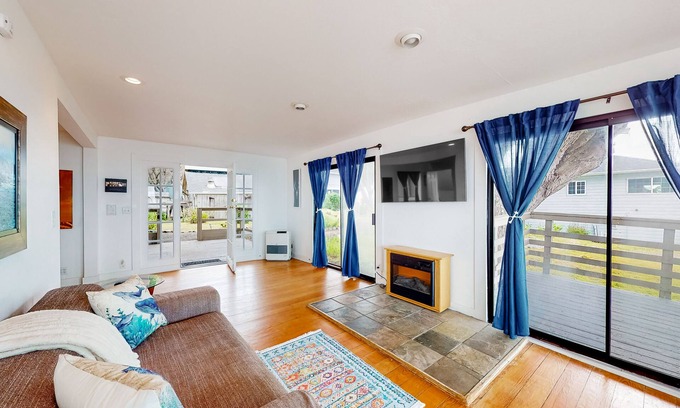 Elk Casa | Quaint cottage on the beach with mountain view, large deck, grill, & W/D
