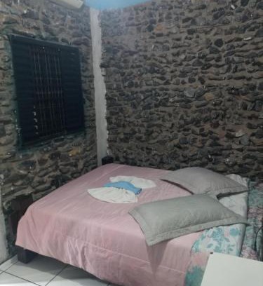 Morada do Ouro Apartamento | Quarto de Pedra