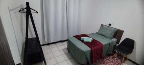 Costa e Silva Casa | Quarto em casa de família