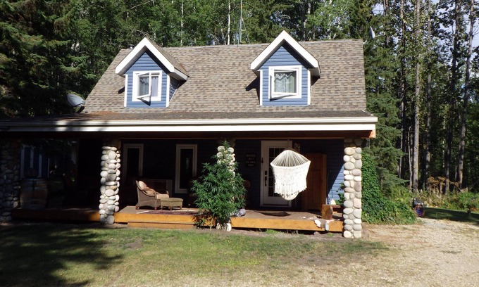 Parkland County Casa | Quiet , secluded , 5 acres outdoor fireplace , indoor wood stove , hot tub