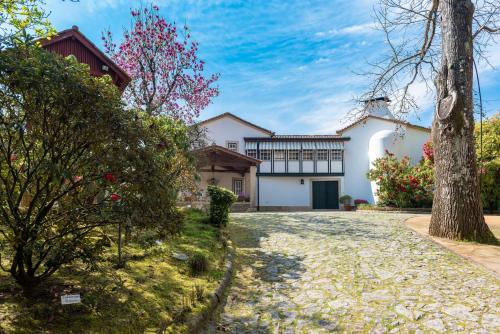 Lever Casa | Quinta de Mourães Casa dos Rododendros
