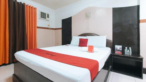 Malolos City Hotel | RedDoorz @ 77 Travellers Inn Malolos Bulacan