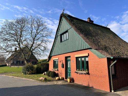 Kronsnest Casa | Reetdachkate am Deich