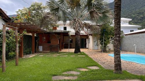 Centro Casa | Refúgio a poucos passos da Praia de Guaecá