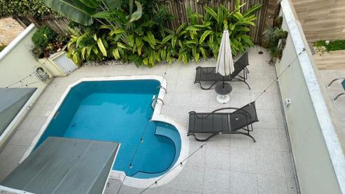 Juquehy Casa | Refúgio em Juquehy no centro a poucos metros do mar com piscina privativa aquecida