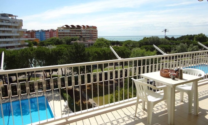 Porto Santa Margherita Apartamento | Relájate en nuestro apartamento con vistas a la piscina - Beahost