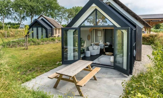 Westenschouwen Casa | Relax in this chalet, experience the spaciousness from the sofa, from the ridge beam to the surround