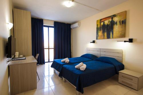 Qawra Hotel | Relax Inn Hotel