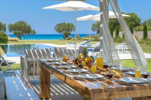 Soroni Villa | Renee Beach Front Executive Luxury Villa