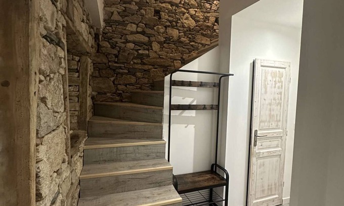 Nexon Casa | Renovated old house with large living room.