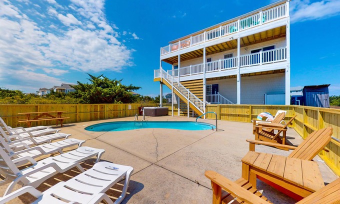 Wind Over Waves Casa | Renovated water-view house with private pool, hot tub, game room, & central AC