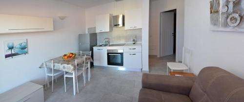Porto Pozzo Apartamento | Residence Eolo