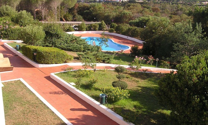 Baja Sardinia Apartamento | Residencia Pinnetta: apartamento de 4 plazas con piscina y wifi gratuitos