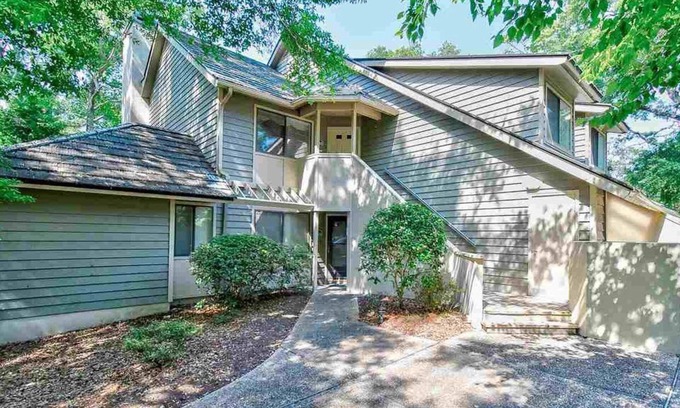 Arcadian Shores Villa | Resort living, short 5 minute walk to the beach