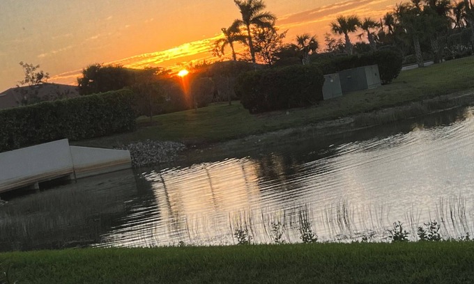 Pelican Preserve Condominio | Resort Style 55+ Community! Includes golf cart and amazing sunset views!
