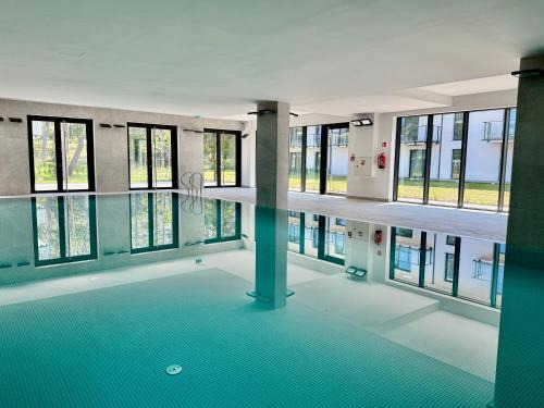 Niechorze Apartamento | Rezydencja Niechorze D304 Classik z Basenem i SPA oraz z 2 sypialniami - 5D Apartments