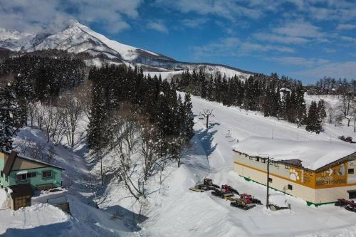 Akakura Chalet De Esquí | Riders Ridge Luxury Chalet sleeps 12 Ski In Ski Out Myoko