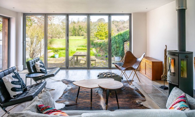 Letheringsett Cabaña | River Cottage - flint cottage in rural village location with stylish interiors