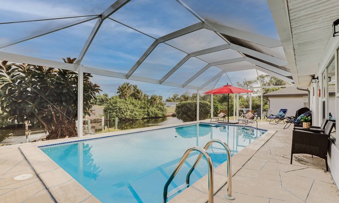 Port Charlotte Casa | Riverfront Florida Retreat w/ Pool, Patio & Grill!