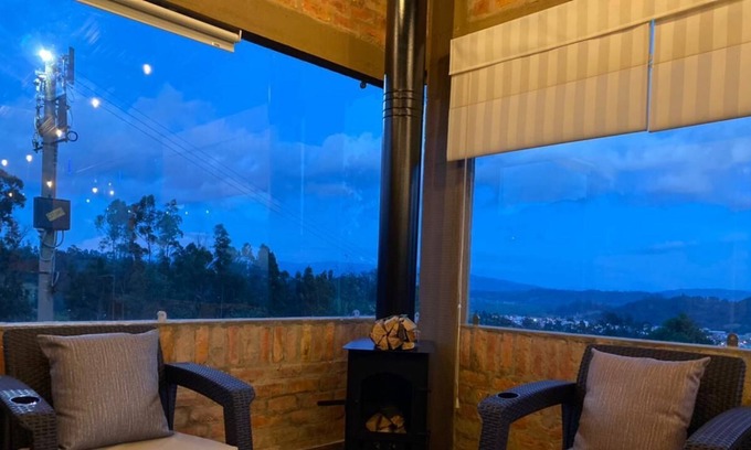 Chiquinquira Apartamento | Romántica cabaña con vista a la ciudad, 10 min del centro