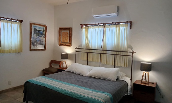 La Ribera Cama Y Desayuno | Room #6 Master with one king size bed, one double bed & one double bunk bed