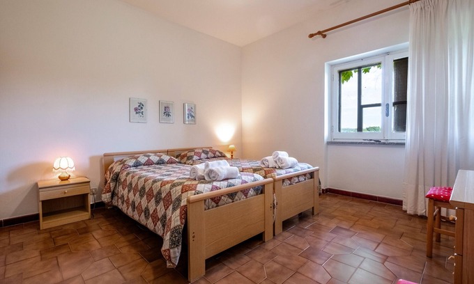 Sorano Apartamento | Habitación 'Camera Est' con piscina compartida, terraza compartida y Wi-Fi