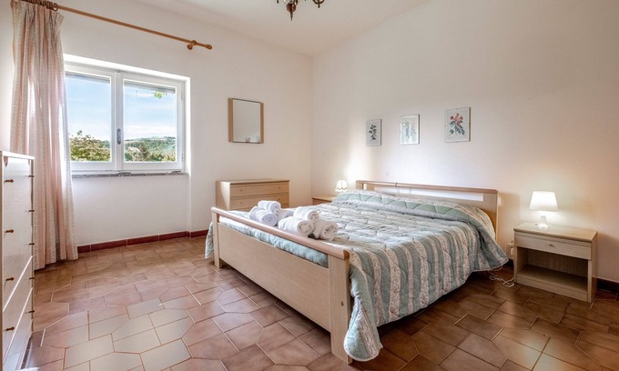 Sorano Apartamento | Habitación 'Camera Nord' con piscina compartida, terraza compartida y Wi-Fi